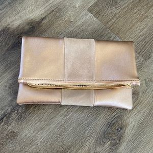 BP Fold over clutch. Rose gold.